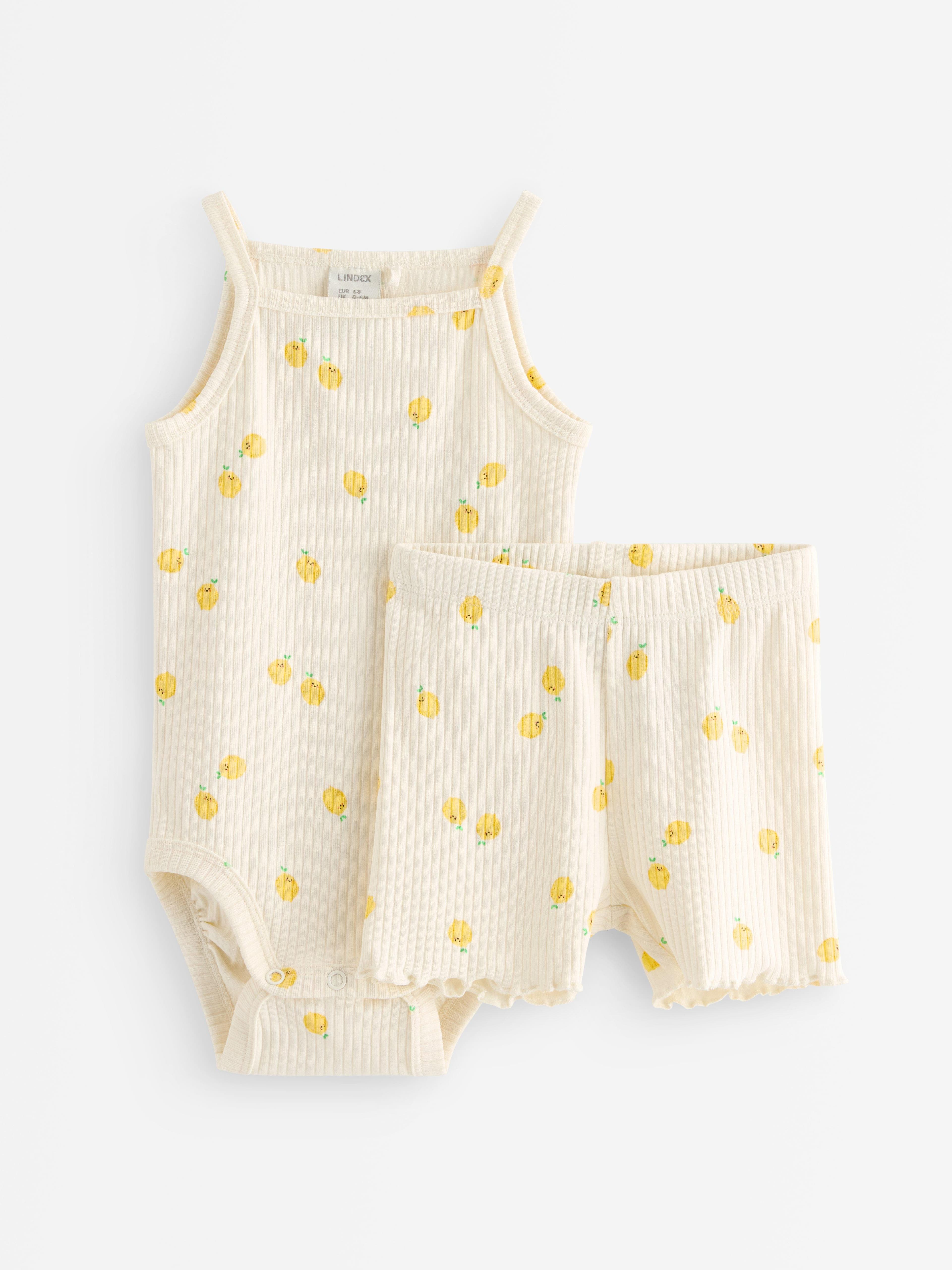 Sett med body og sykkelshorts