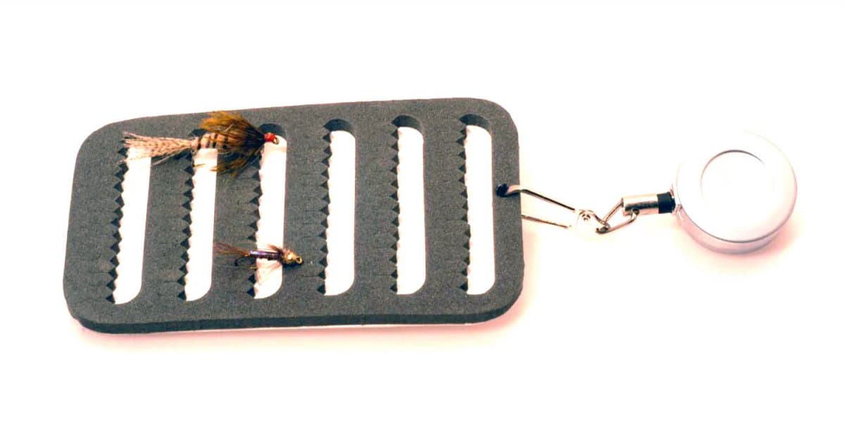 A.Jensen Pin On reel With Fly Patch