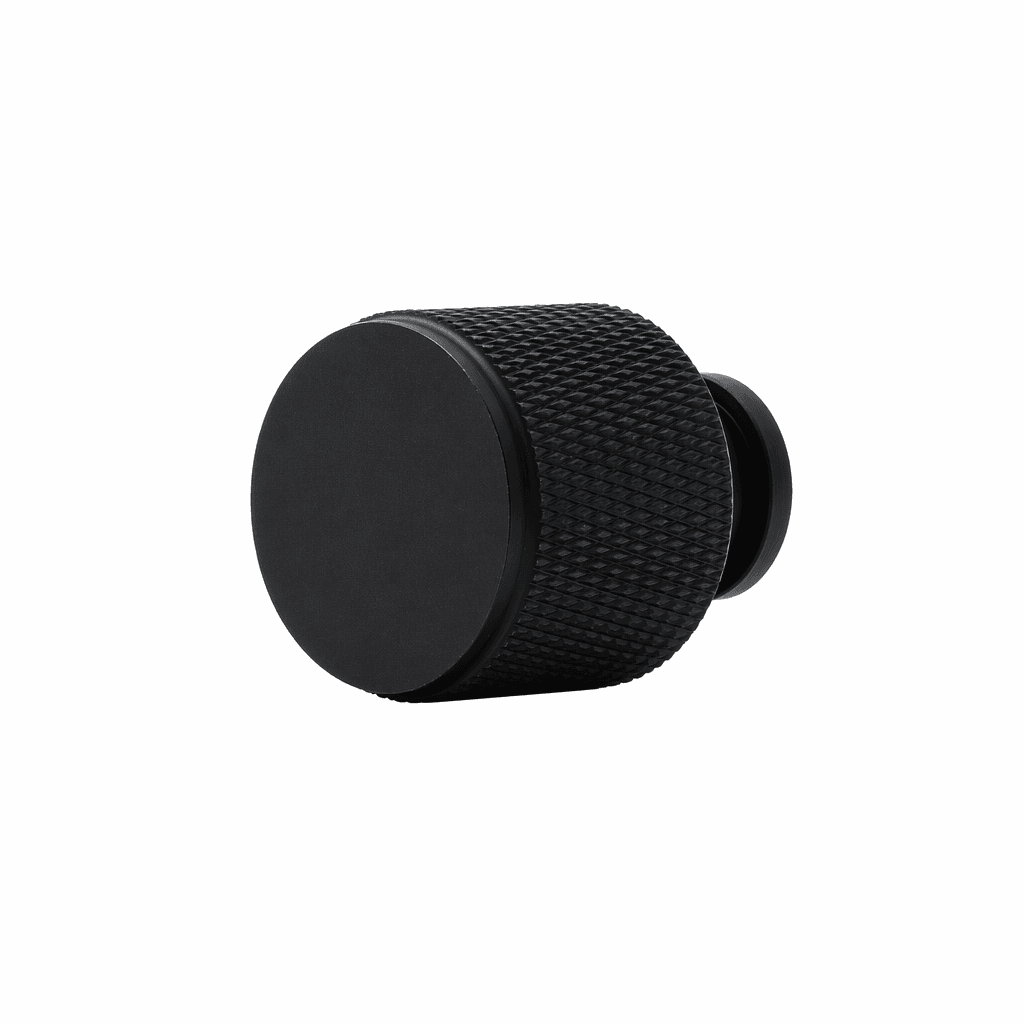 Skapsknapp Jirana i matt svart med ribbet kant, 22 mm