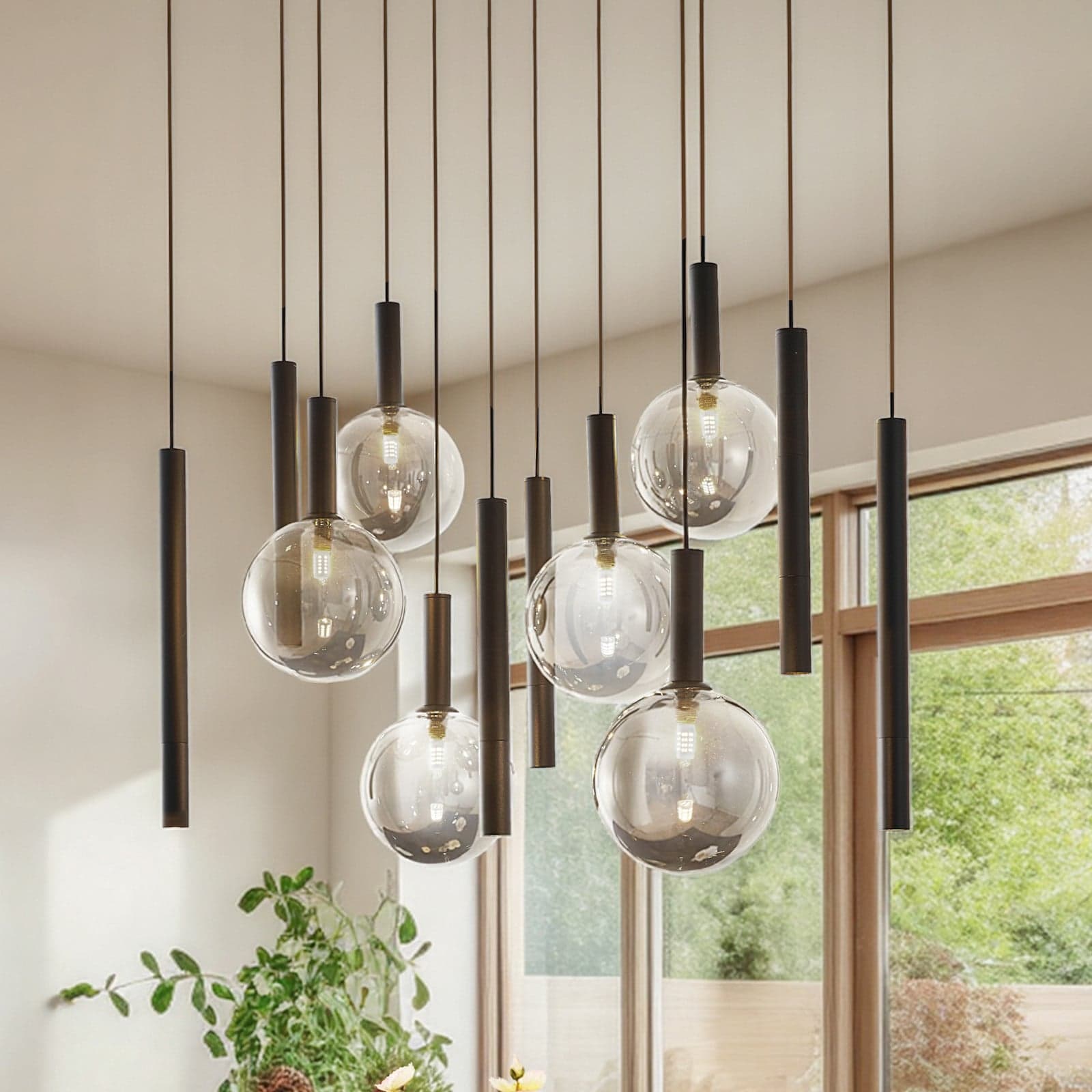 Lumavia hengelampe, svart/klar, G9, glass, 12 lyskilder – Lucande - Spisestue - Moderne - Med flere lyskilder